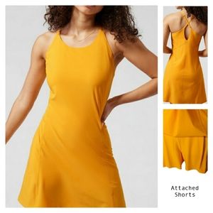 ATHLETA Infinity Dress Stretch With Attached Shorts Gold Yellow Size Large NWT